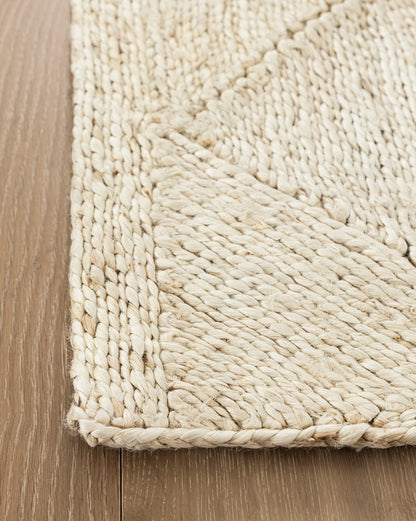 Tapis en jute blanchi tressé en losanges