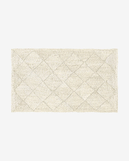 Tapis en jute blanchi tressé en losanges