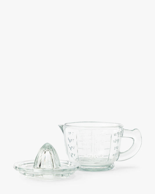 Presse-agrumes en verre avec verre doseur